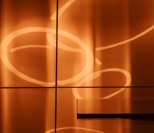 Orange logo on a wall